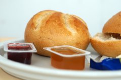 As of 2024, bed and breakfast facilities are banned from offering single-serving packages for jam, butter, peanut butter and coffee cream